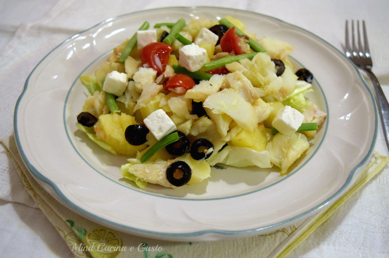 Insalata tiepida di baccalà con patate e olive nere